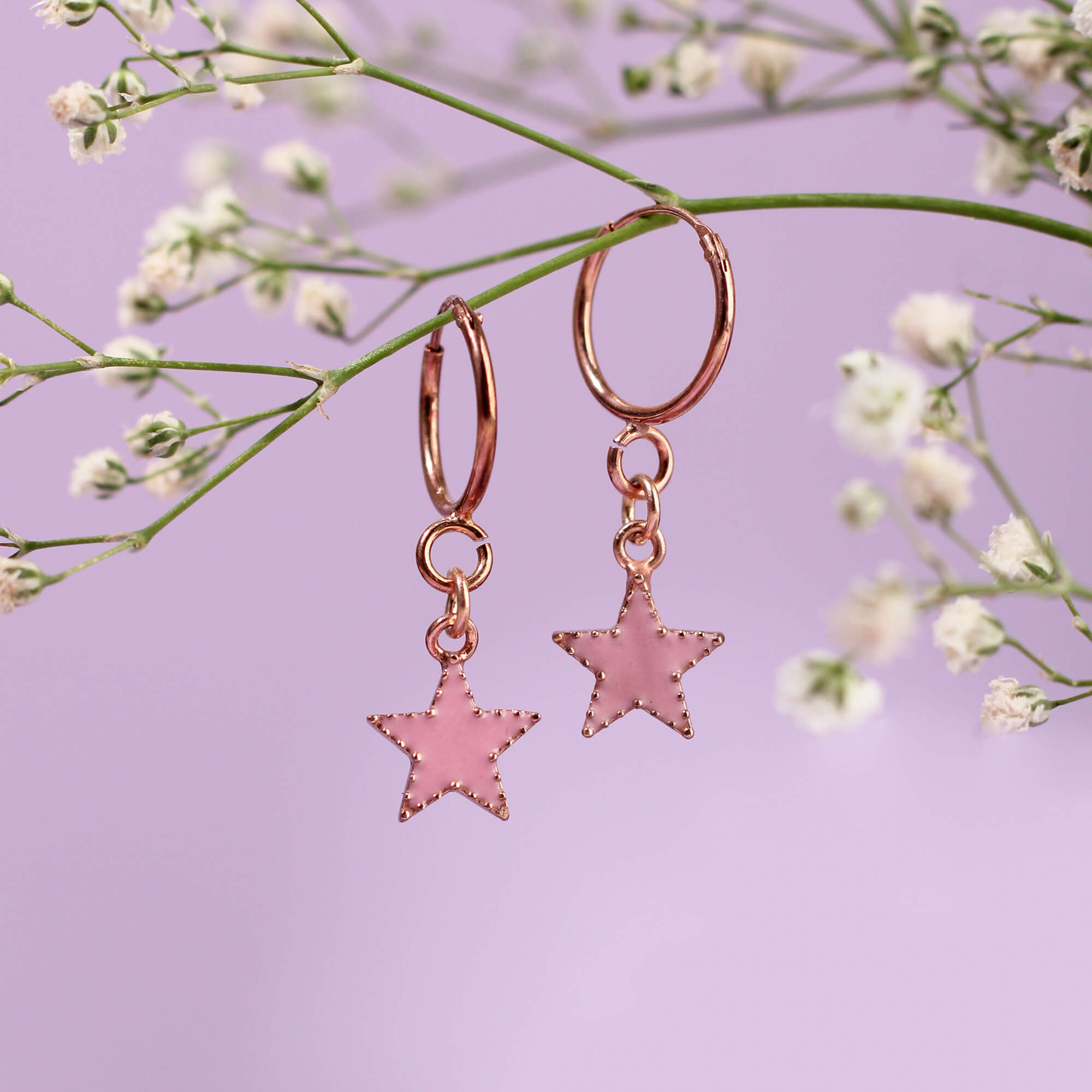 Pink star earrings